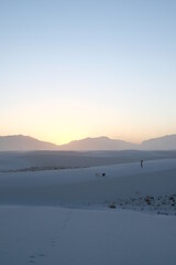 Woman and Two Dogs at Sunset at White Sands National Park, New Mexico