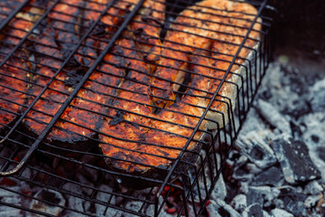 cooking fish outdoors barbecue close-up charcoal meal