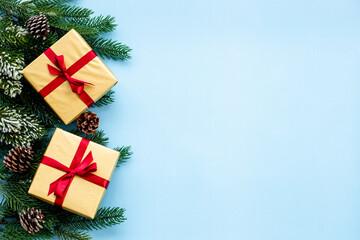 Christmas gifts background - golden gift boxes with red ribbon