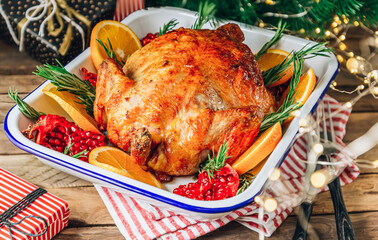 Festive celebration roasted chicken with Pomegranate and Orange