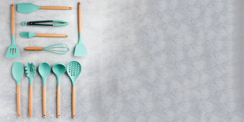  Set of kitchen utensils on a gray background. The concept of the kitchen, the preparation of...