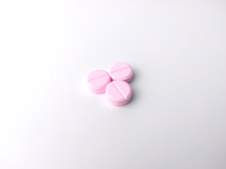 Piles of pills and capsule on white background,isolated.Selective focus.