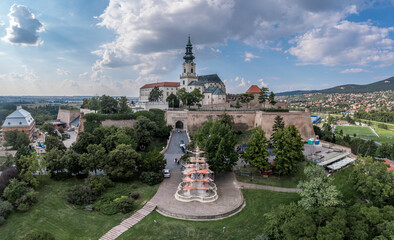 Aerial view of Nitra castle in Slovakia with bastions and sentry towers, bishop palace and baroque church tower above the city