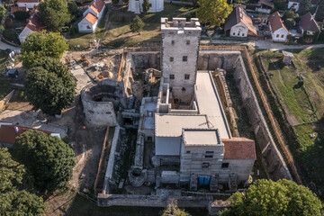 Aerial view of Nagyvazsony Kinizsi castle with newly restored palace building, medieval lavatory on donjon, barbakan protecting the gate in Veszprem county hungary