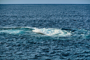 Fototapeta premium a natural rocks emerged in the open ocean name 'Richelieu Rock', one of the famous scuba diving site in Thailand