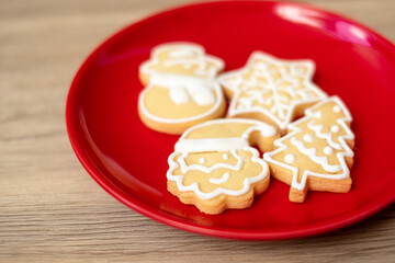 Merry Christmas with homemade cookies on wood table background. Xmas, party, holiday and happy New Year concept