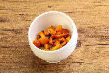 Marinated pickled honey mushrooms in the bowl