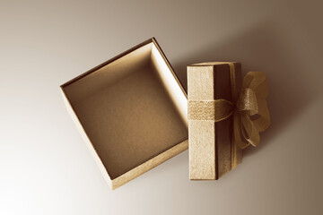 Open gift box on gold background