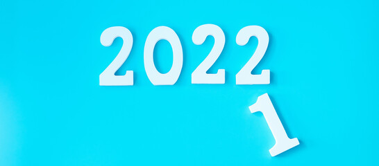 2022 white text number on blue background. Resolution, plan, review, goal, start and New Year holiday concepts
