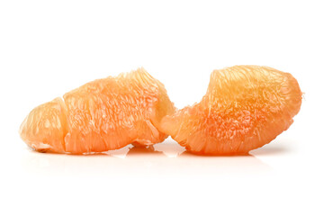 peeled pomelo pieces isolated on white background. Tasty fresh fruit eating concept.