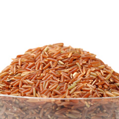 Red rice on white background 