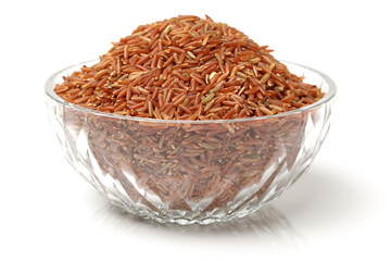 Red rice on white background 