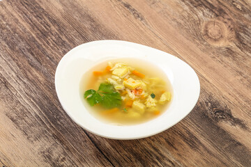 Tasty chicken soup with carrot