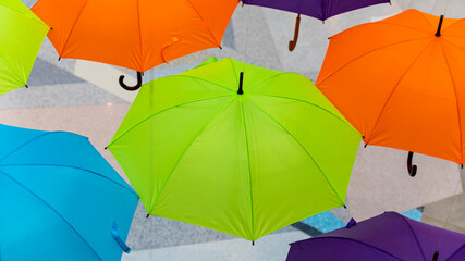 Multiple colorful umbrellas. Fashion and accesories concept