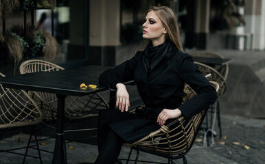 Beautiful lady in black coat