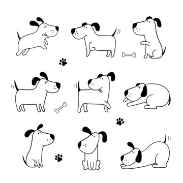 Set of funny dogs. Black and white color.Doodle cartoon style. Hand draw cute dogs in sketch style. 