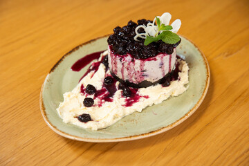 Blueberry vanilla raw cake served on plate