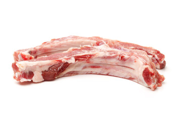 Raw spare ribs on white background