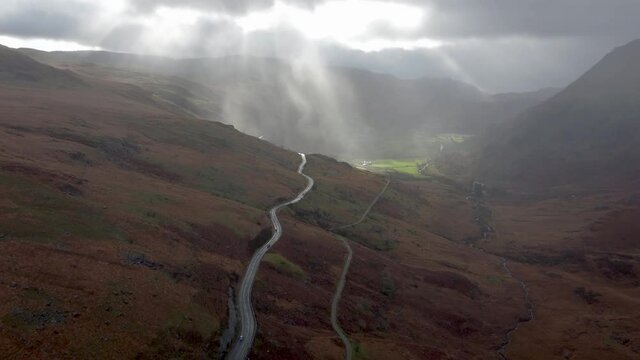 Snowdonia National Park with Celestia God Rays Shining on Beautiful Landscape - Aerial