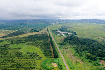 Scenic aerial view flying over the land field.