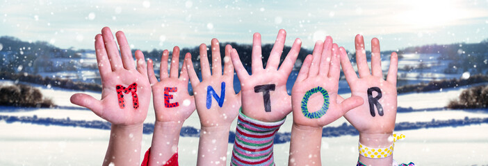 Children Hands Building Word Mentor, Snowy Winter Background