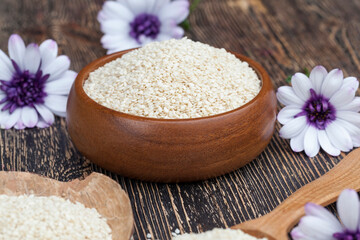 white sesame seeds on a wooden table