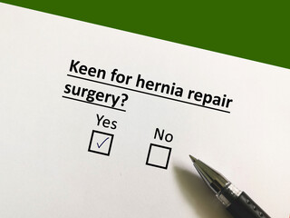One person is answering question about surgery. The person is keen for hernia repair surgery.