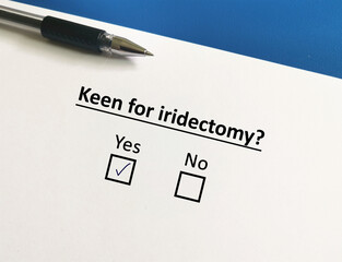 Fototapeta premium One person is answering question about surgery. The person is keen for iridectomy.
