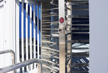 Full height gate turnstile door access control with sensor scanner.