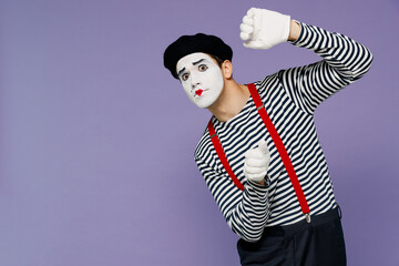 Charismatic amazing marvelous ecstatic young mime man with white face mask wear striped shirt beret...