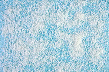 Fototapeta na wymiar White Snow On A Blue Background
