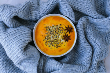 Homemade carrot ginger curcuma spicy soup. Seasonal Pumpkin traditional soup with creamy silky...
