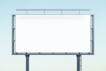 Obraz premium Blank white billboard on blue sky background at sunset, front view. Mockup, advertising concept