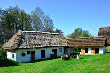 Fototapeta na wymiar A traditional Polish wooden house in ethnographic park in Nowy Sacz, Poland