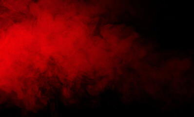 Red smoke on black background