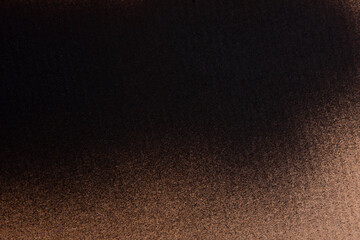 Fototapeta na wymiar colored spray black paint on cardboard
