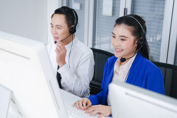 asia man and beautiful asian woman working call center operator with headset in office or workplace