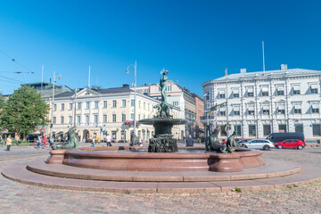 Helsinki, Finland - August 5, 2021: Havis Amanda on Market Square. Havis Amanda is a fountain and a statue in Helsinki, Finland by the sculptor Ville Vallgren.