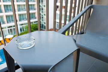 Ashtray on the table in terrace