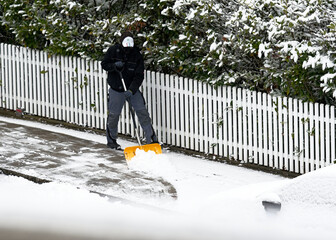 Janitor snow clearing in winter