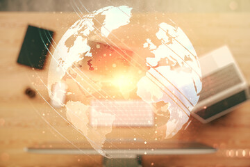 Multi exposure of abstract creative digital world map on laptop background, research and analytics concept