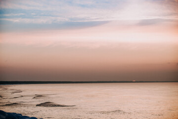 Winter sunset in the sea, colorful, dramatic sky. Bright colors.