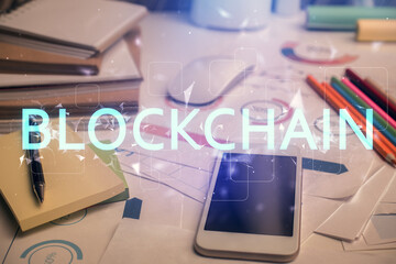 Double exposure of blockchain theme drawing and cell phone background. Concept of cryptomarket