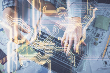 Double exposure of man and woman working together and technology theme drawing. Computer background. Top View. High tech concept.