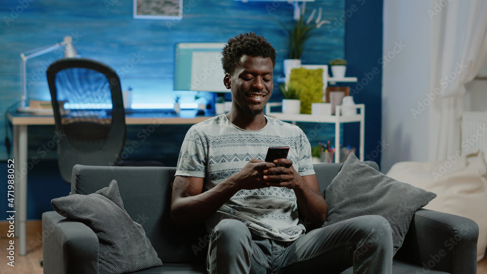 Poster adult holding smartphone for text messages on touch screen. man using phone after remote work, texti