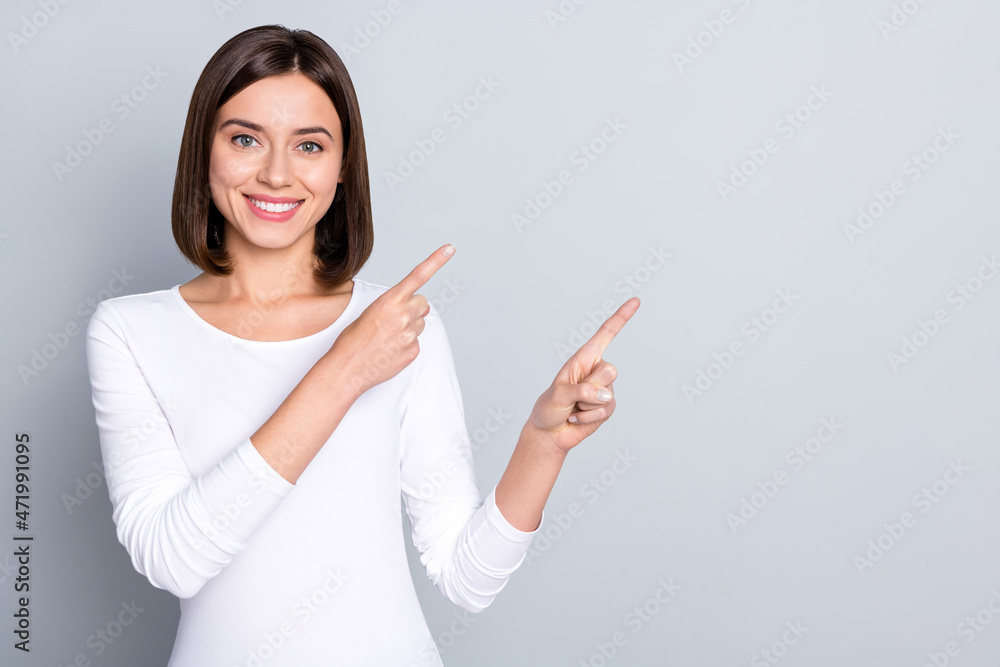 Sticker photo of lovely bob hairdo millennial lady show empty space wear white shirt isolated on grey color 