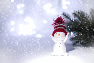 Happy snowman standing in a snowy winter day. Happy snowman standing in a winter Christmas...
