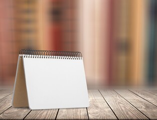 Blank clean 2021 calendar month page showing date on wooden table