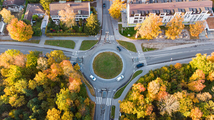 Aerial view of traffic in a roundabout next to a city in Germany