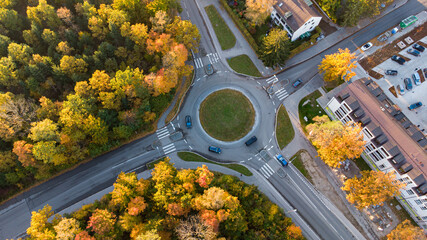 Aerial view of traffic in a roundabout next to a city in Germany © Pablo